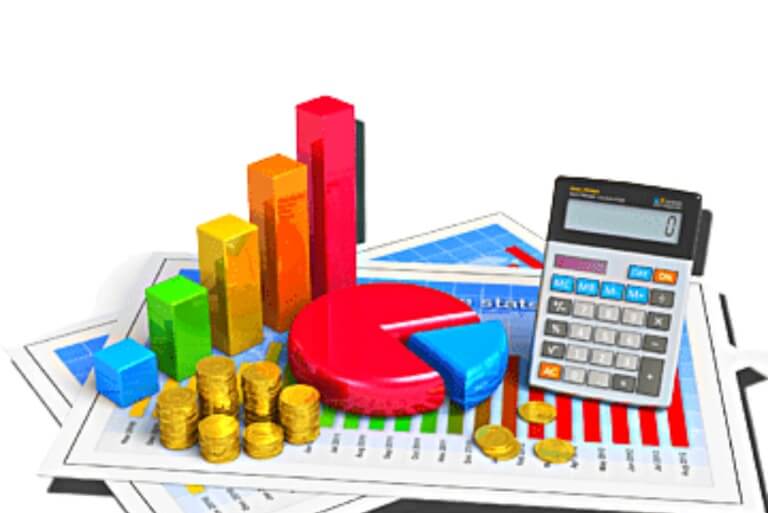 Colorful charts, calculator, and coins on financial documents.