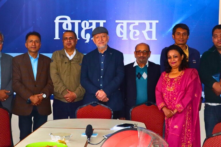 Group of people at an educational discussion event.