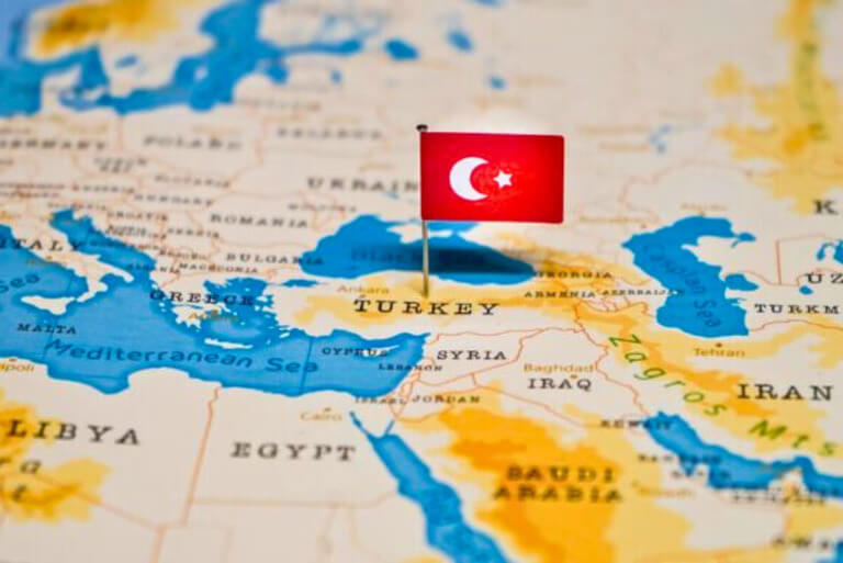 Map highlighting Turkey with a flag pin.