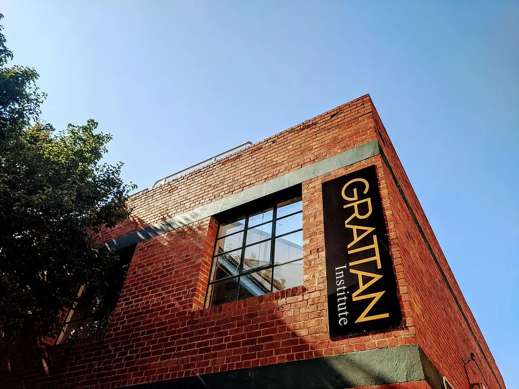 grattan institute building sign against blue sky