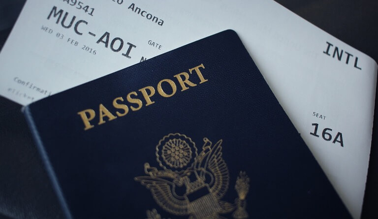 Passport and flight ticket for international travel.